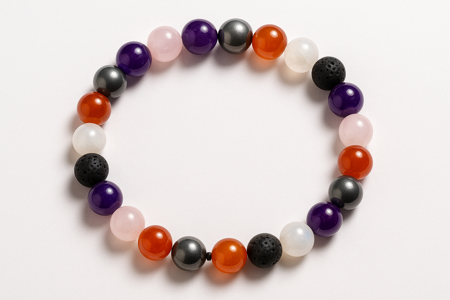 amethyst-rose quartz-hemetite-carnelian-moonstone-black lava beads create a bracelet like this pattern and all 8 mm and no same crystals together distribute altogether equally