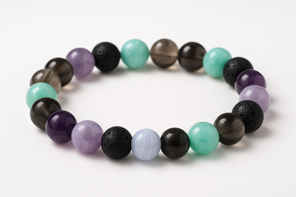 An 8mm crystal bracelet with Amethyst, Lepidolite, Blue Lace Agate, Black Lava , Amazonite, Smoky Quartz beads, arrange equally distributed no same crystal or color together make it aesthtic no blured